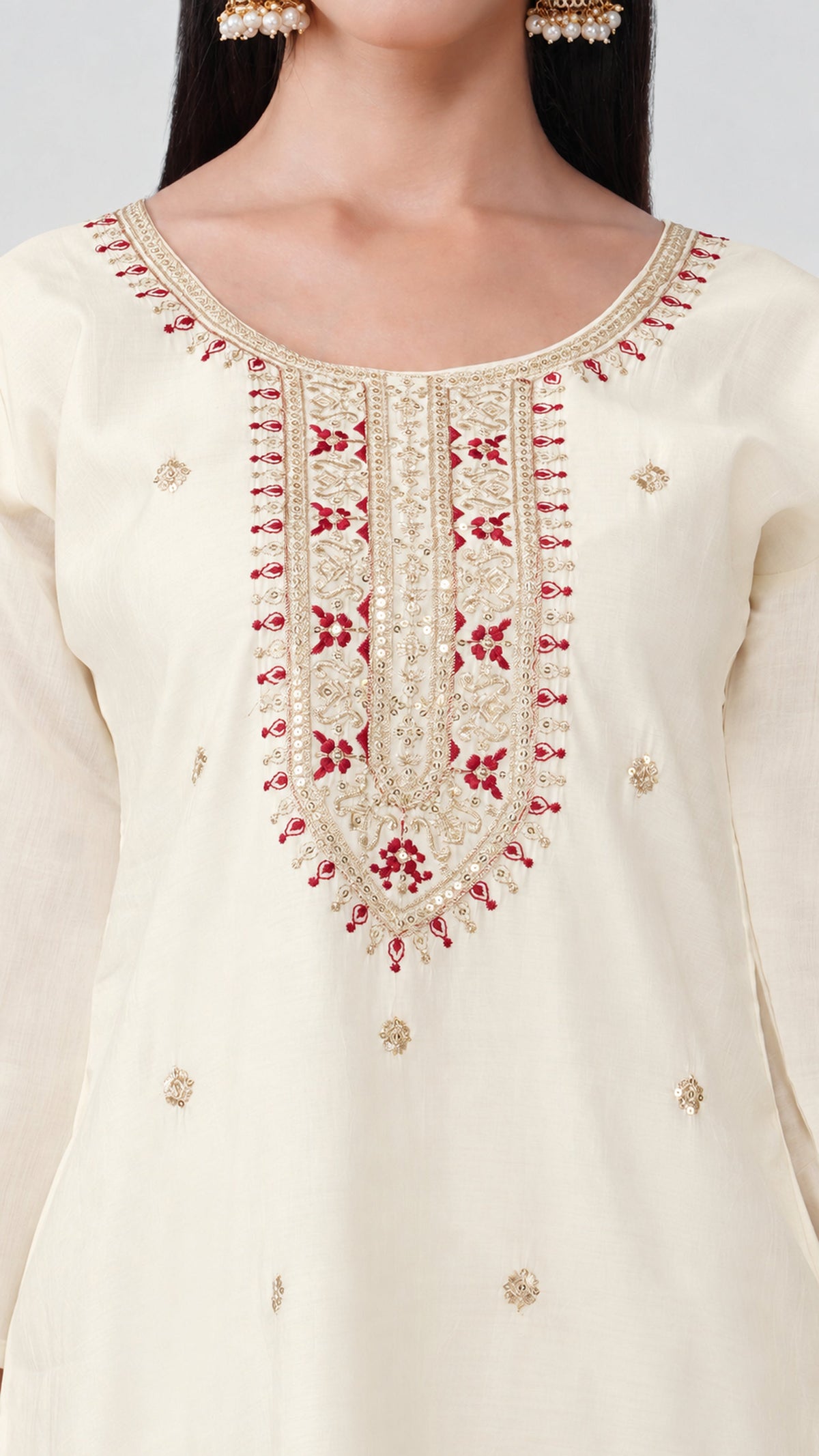 Cream kurta top and trousers with maroon woven dupatta. 