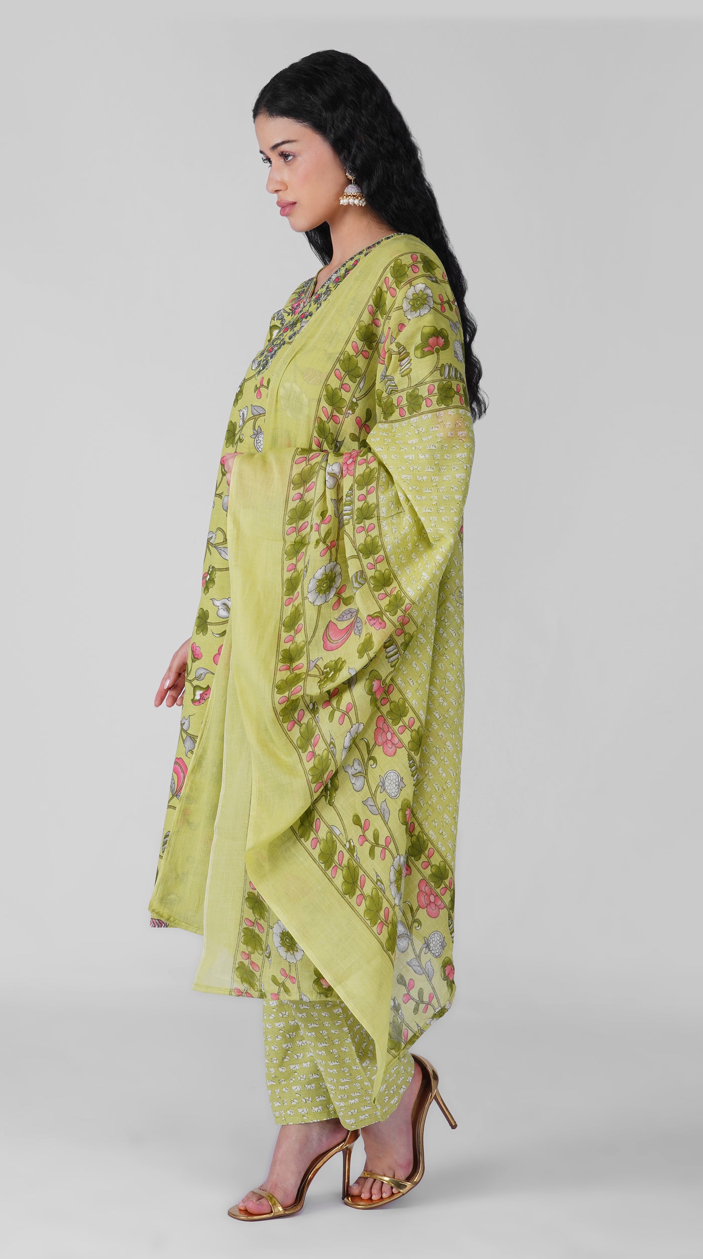 Side profile of green floral cotton kurta set