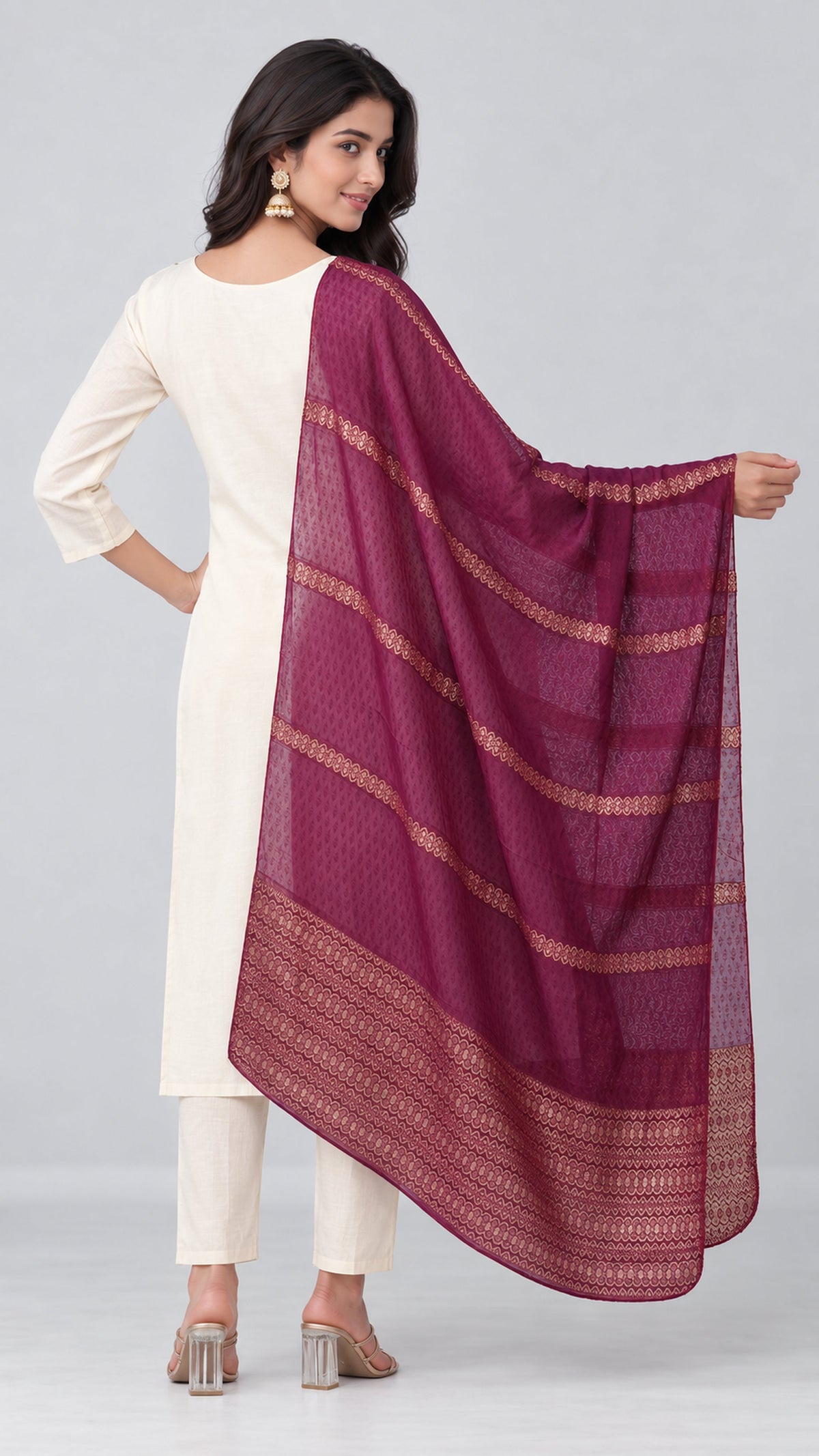 Purple woven dupatta with white cotton silk suit. 