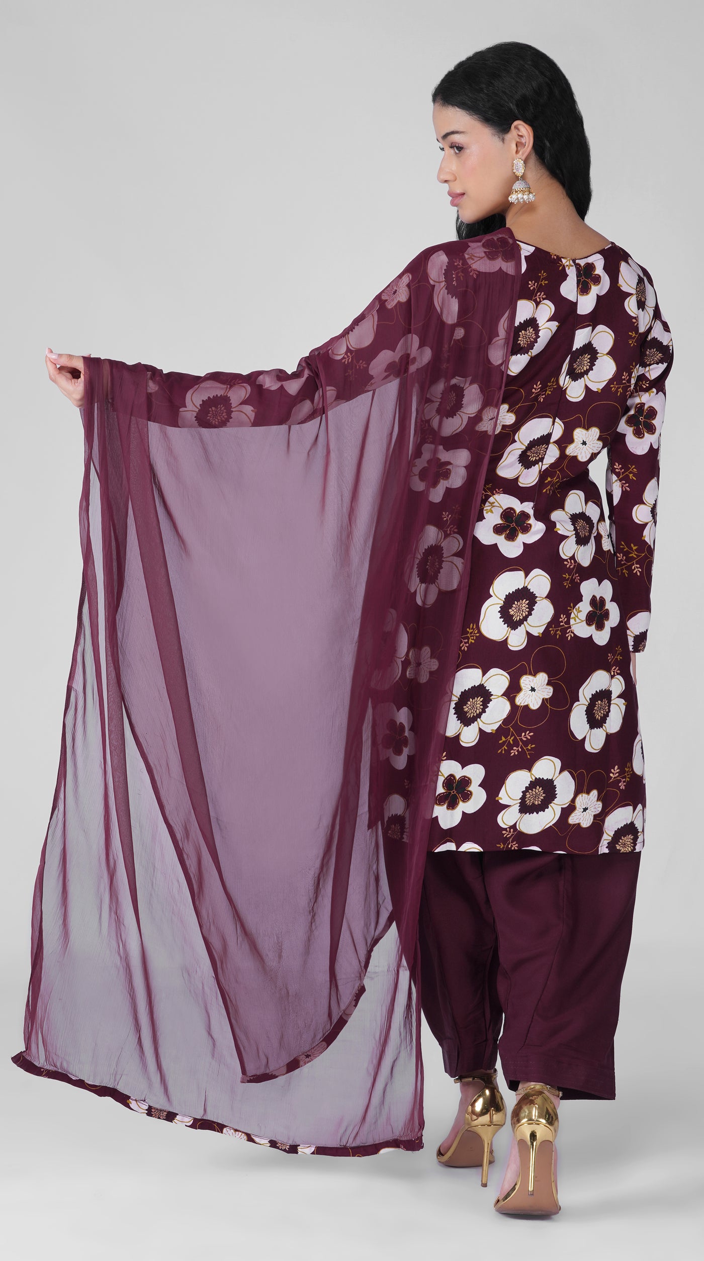 Side profile of wine floral print rayon suit