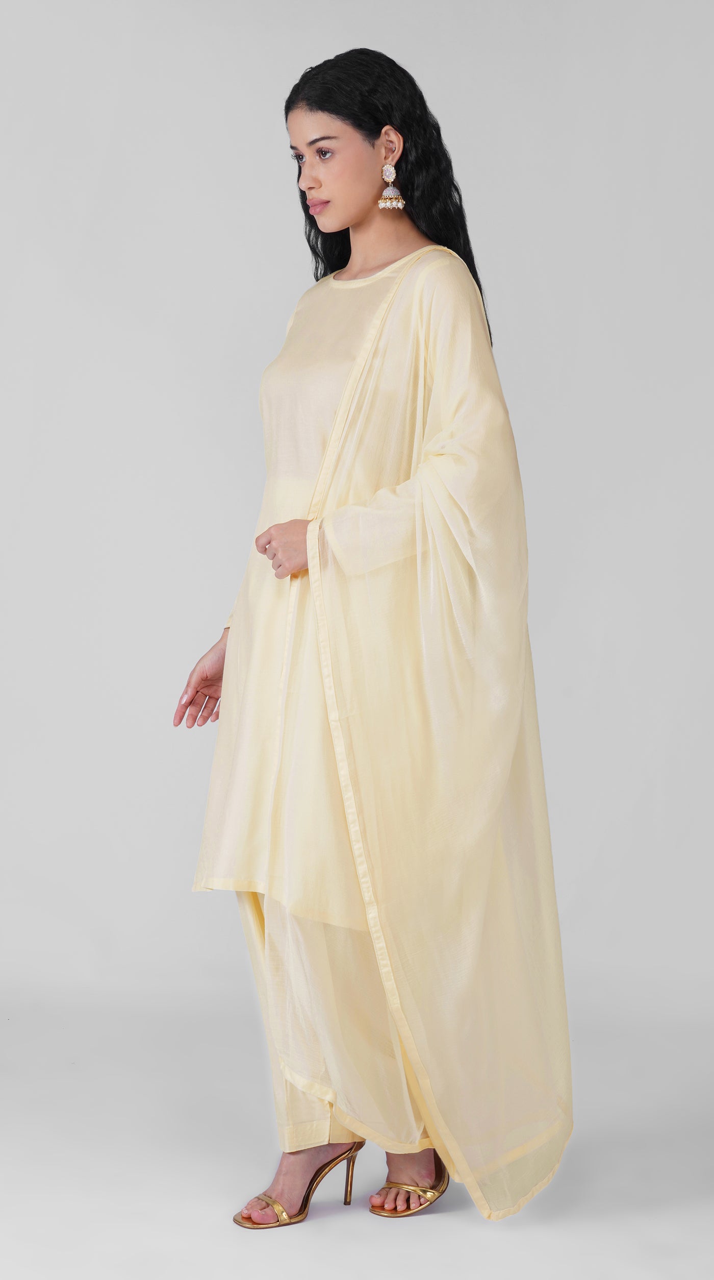 Front view of plain ivory rayon ethnic suit