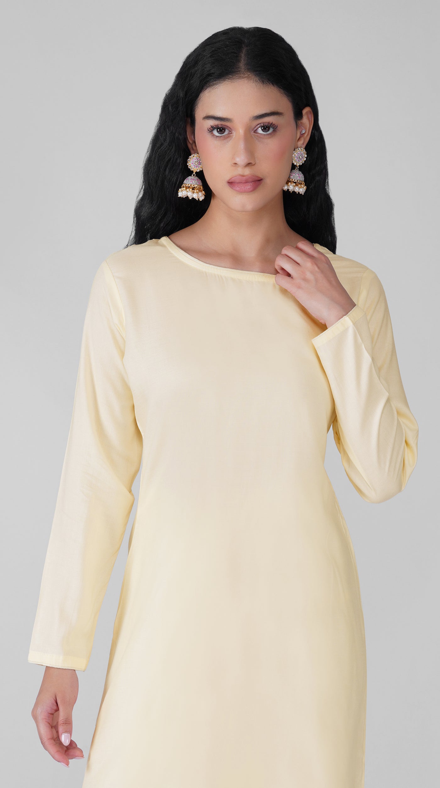 Back view of plain ivory rayon suit with chiffon dupatta