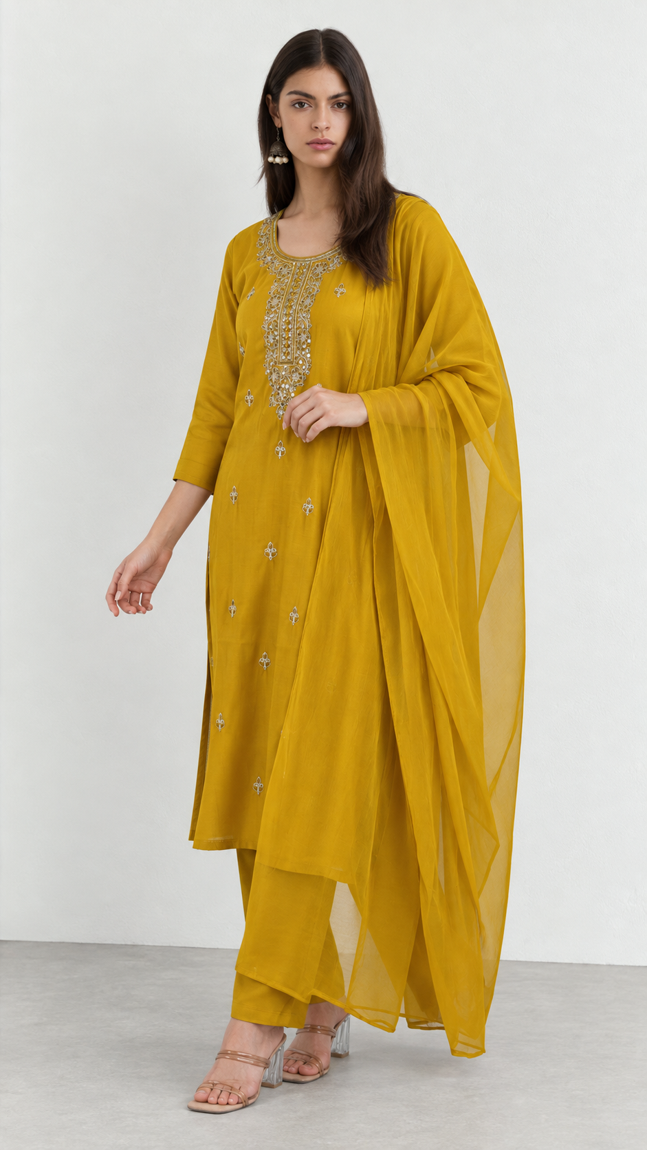 Mustard embroidered cotton suit set styled with matching dupatta