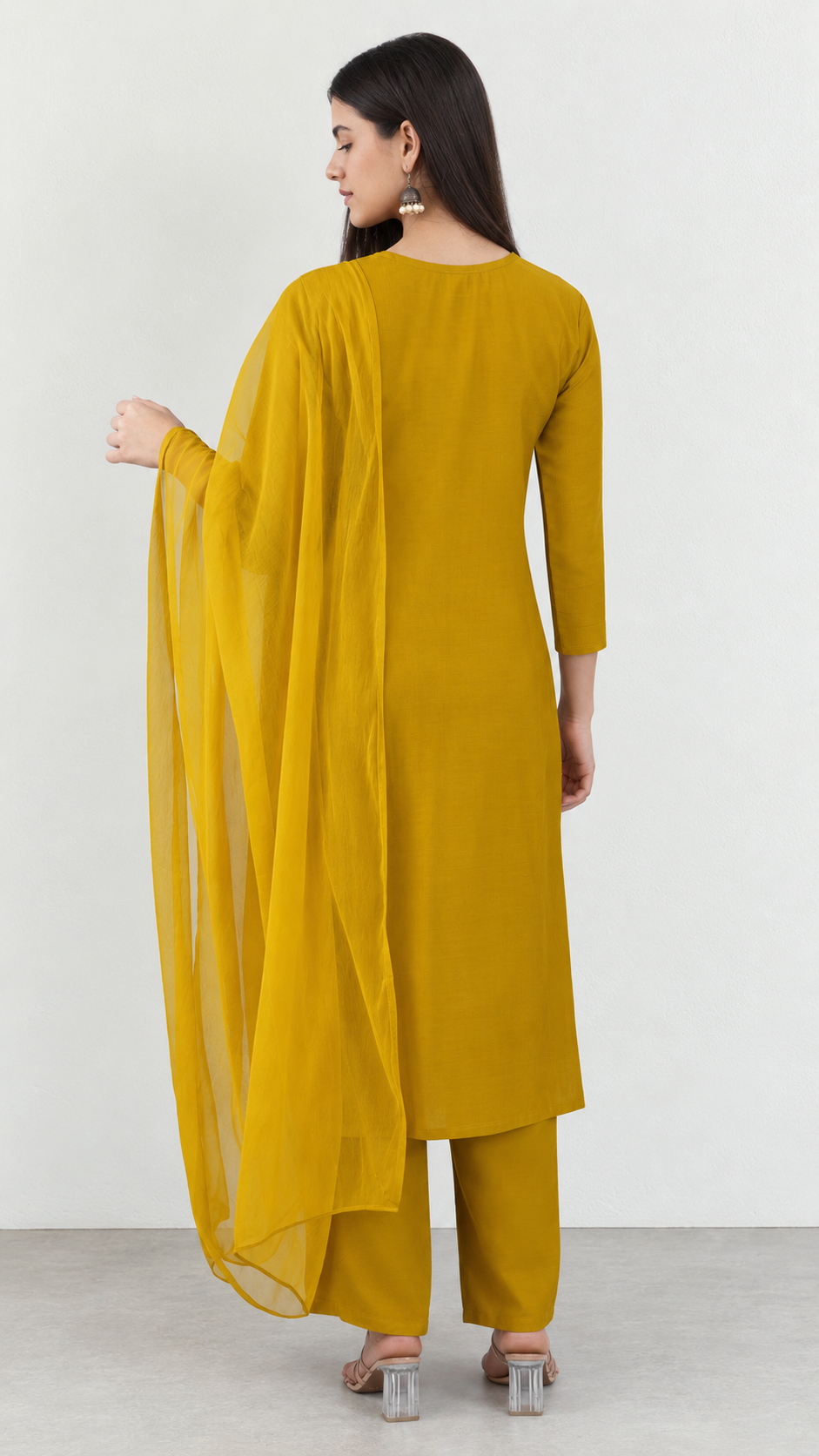 Mustard embroidered cotton suit set styled with matching dupatta