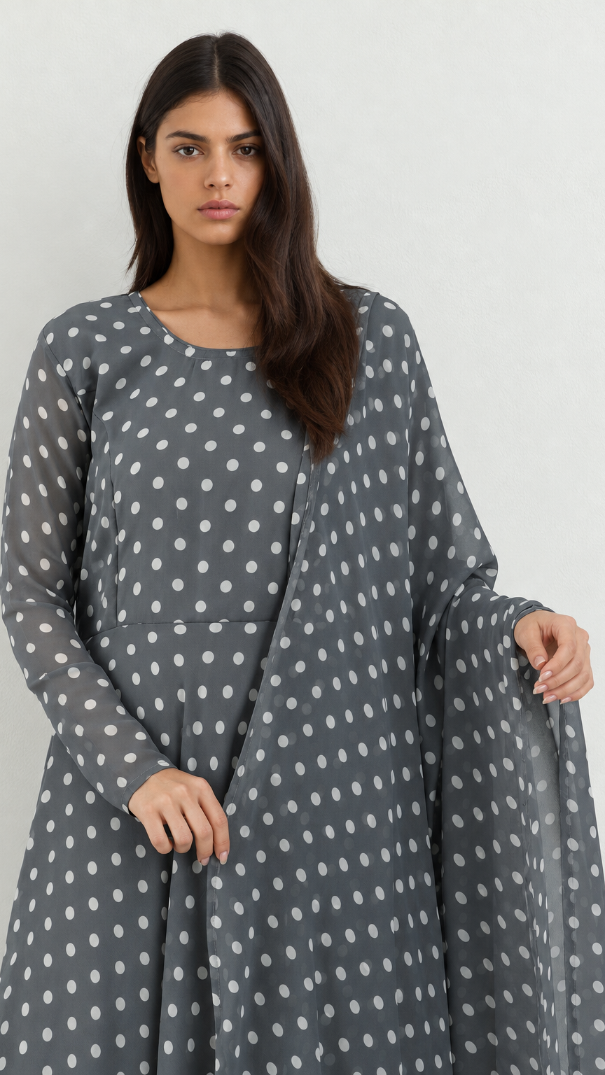 Grey polka dot ethnic suit with bias cut styling and chiffon dupatta