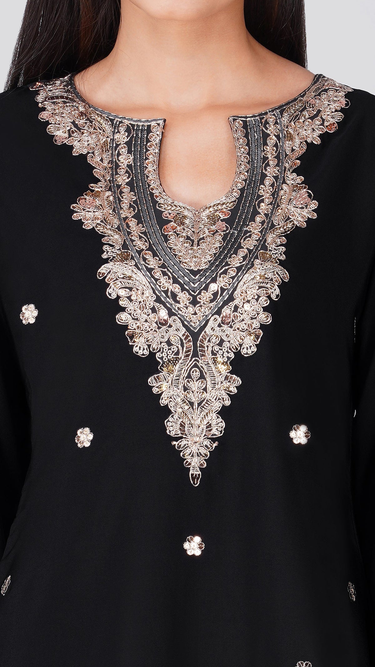 Close-up of a black kurta featuring an elaborate silver and gold embroidered yoke with a split neckline, embellished with small rhinestone-like studs.