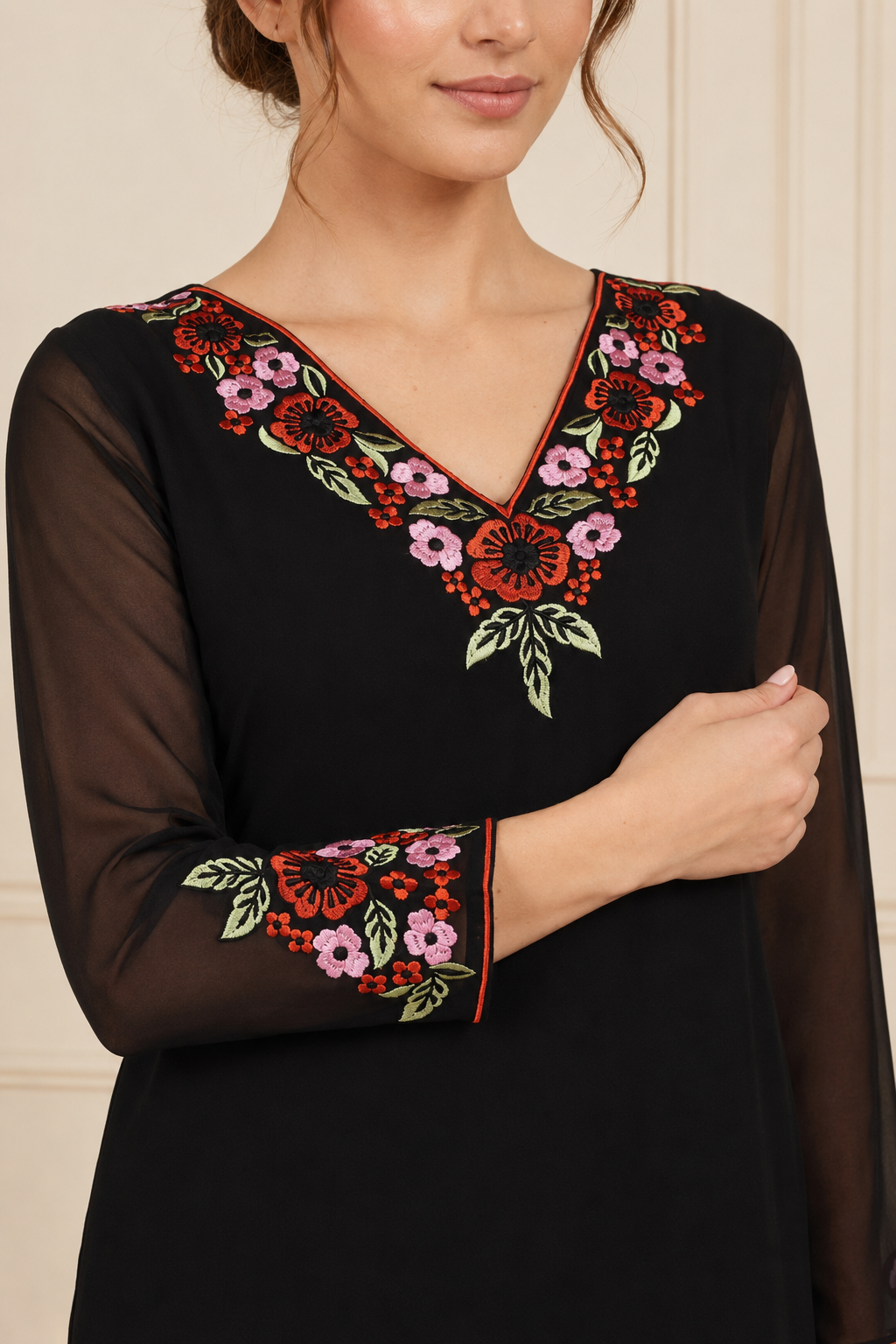 Black women’s embroidered salwar kameez suit with matching sharara trousers and floral printed dupatta, elegant Asian ethnic wear by Diya Online