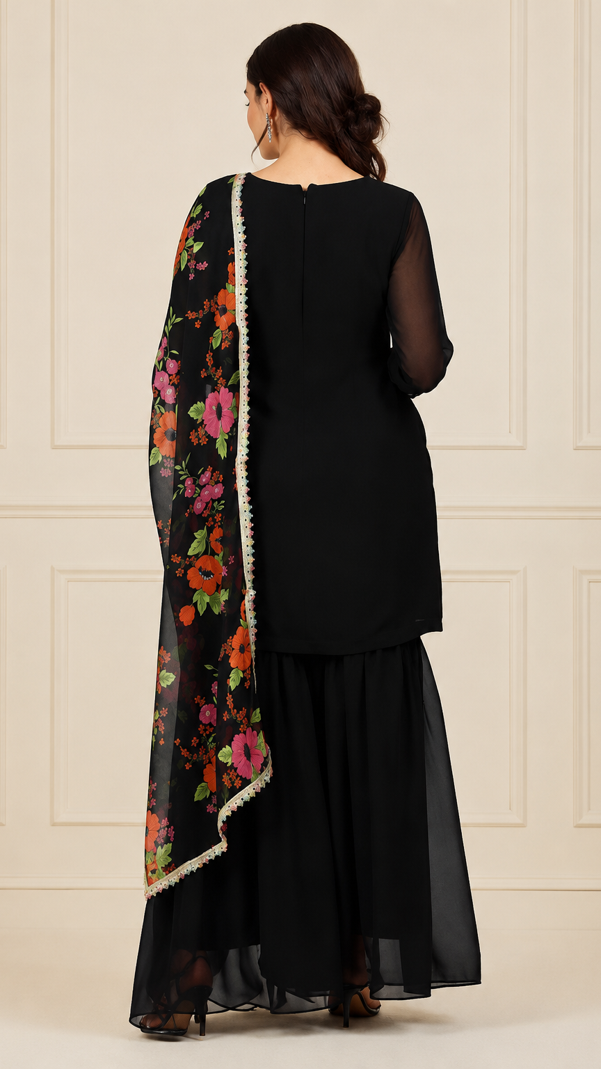 Black women’s embroidered salwar kameez suit with matching sharara trousers and floral printed dupatta, elegant Asian ethnic wear by Diya Online
