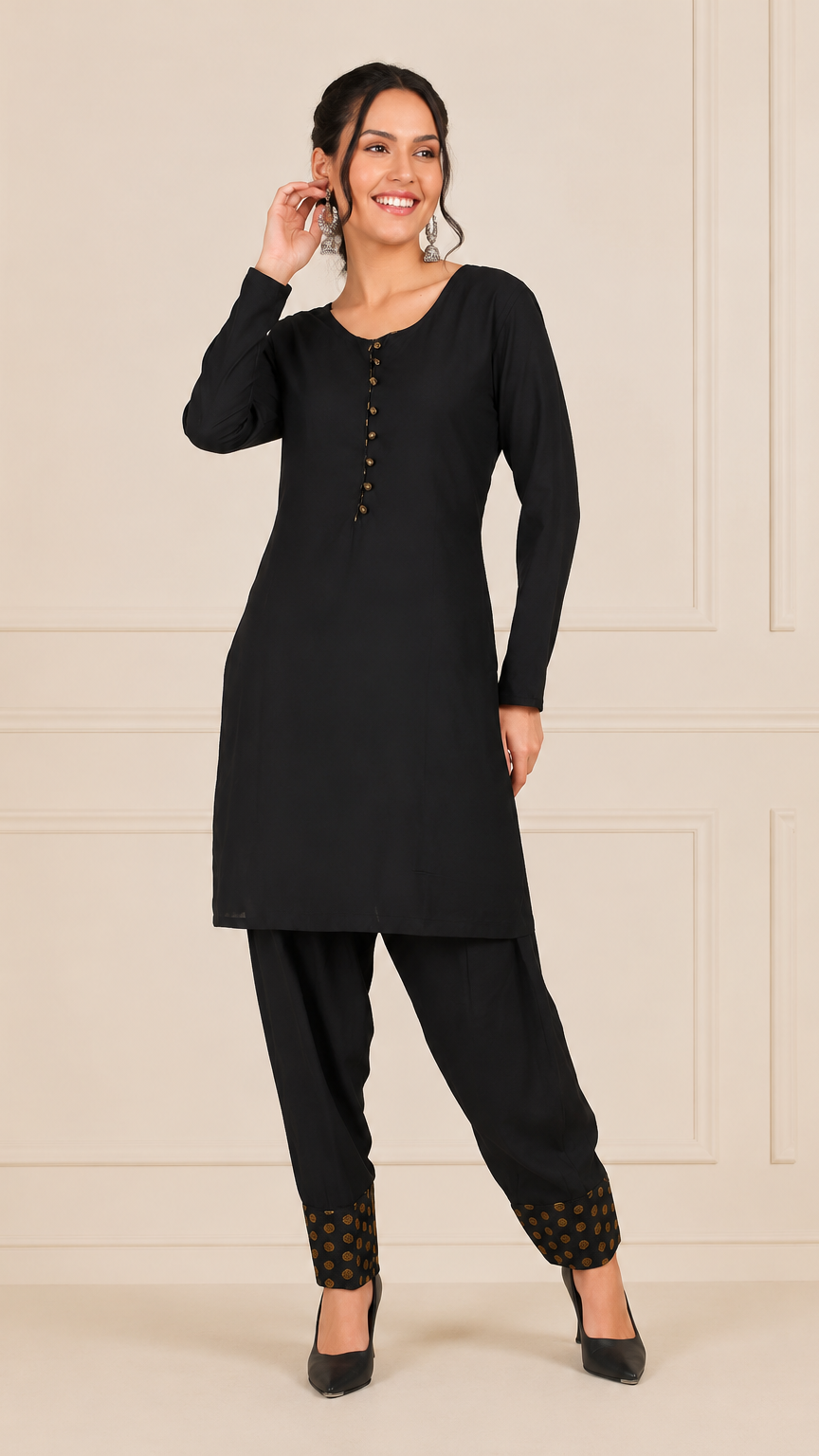 Black women’s salwar kameez suit with matching trousers and gold polka dot chiffon dupatta, modest Asian wear by Diya Online