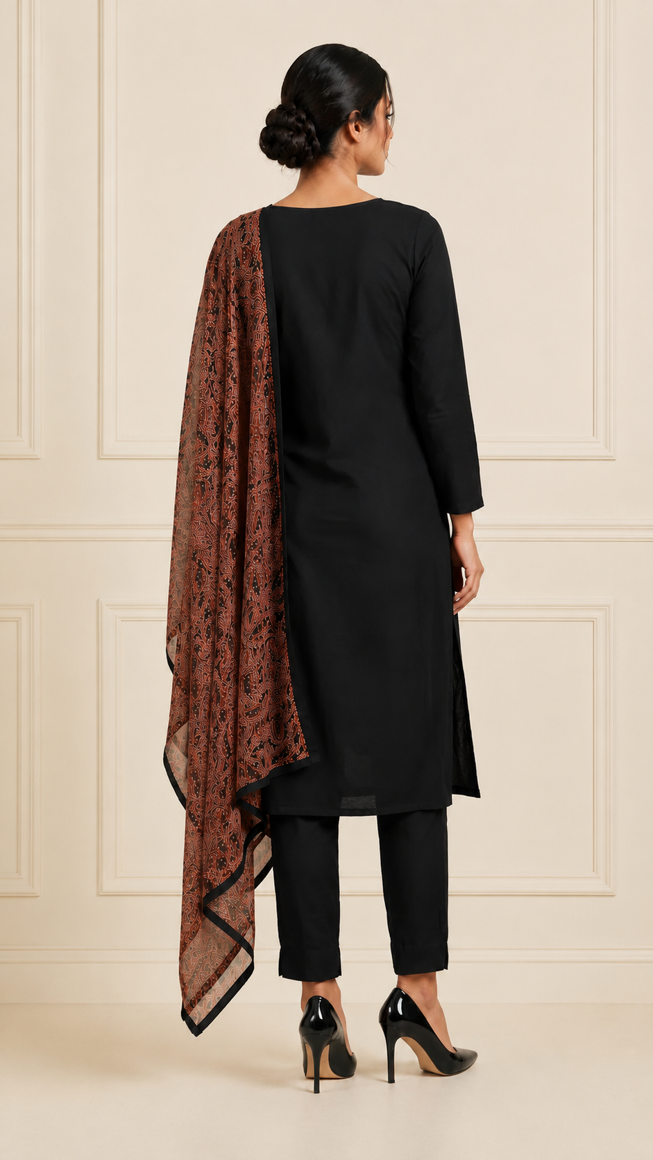 Diya Online designer black kurta set with matching trousers and paisley dupatta for women, comfortable Indian ethnic wear, office wear salwar suit, festive outfit, and traditional occasion attire.