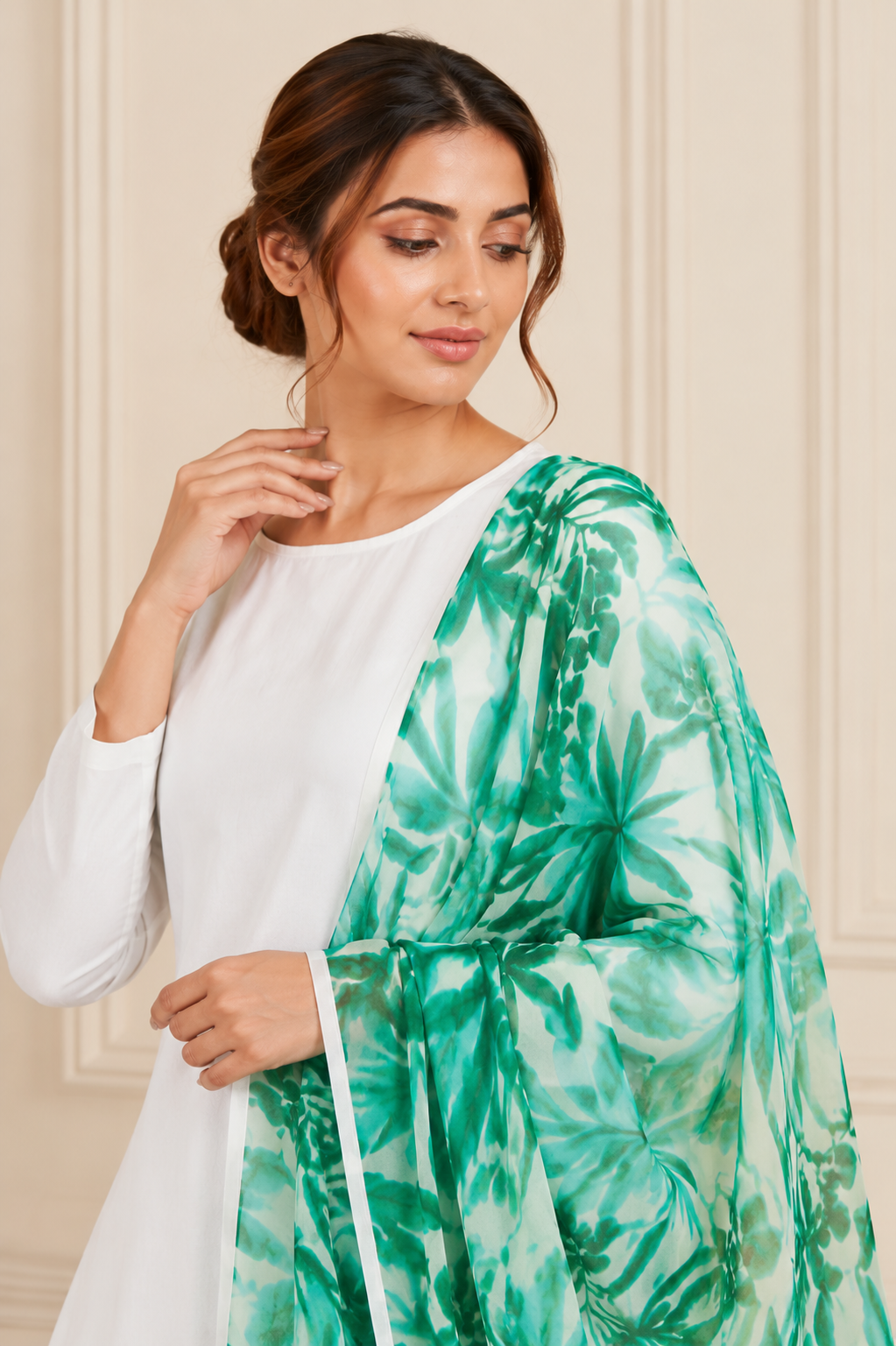 Buy elegant white straight-cut kurta set with green floral printed dupatta for women, premium ethnic wear suit for festive occasions, office wear, casual outings, and summer fashion. Diya Online