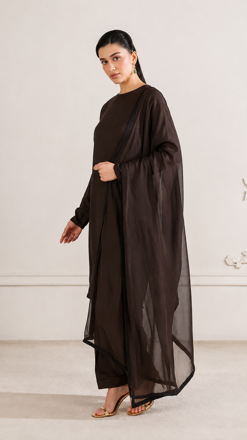 Buy plain chocolate brown Pakistani salwar kameez with long kurta, gathered trousers and matching sheer dupatta for women online at Diya Online.