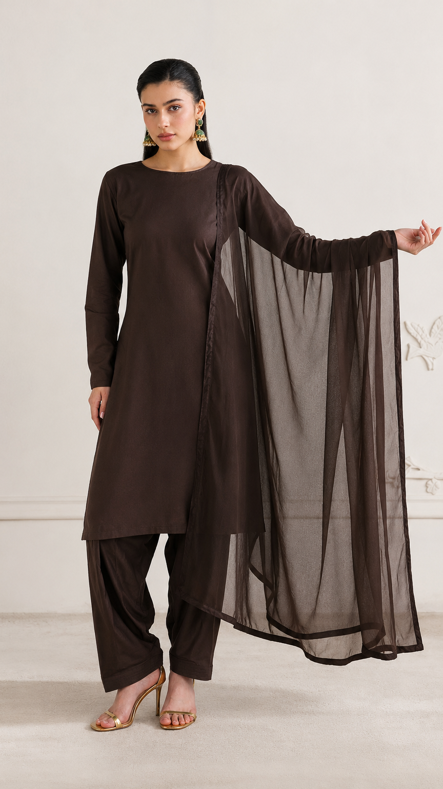 Buy plain chocolate brown Pakistani salwar kameez with long kurta, gathered trousers and matching sheer dupatta for women online at Diya Online.