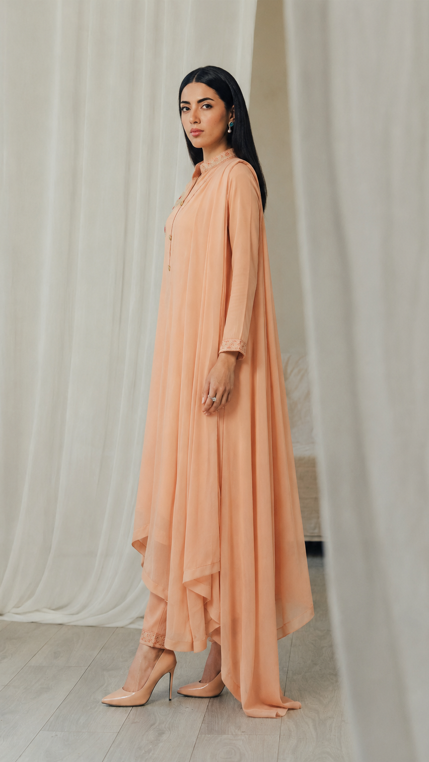 Peach women’s embroidered Anarkali salwar kameez suit with matching trousers and flowing chiffon dupatta, elegant Asian ethnic wear by Diya Online