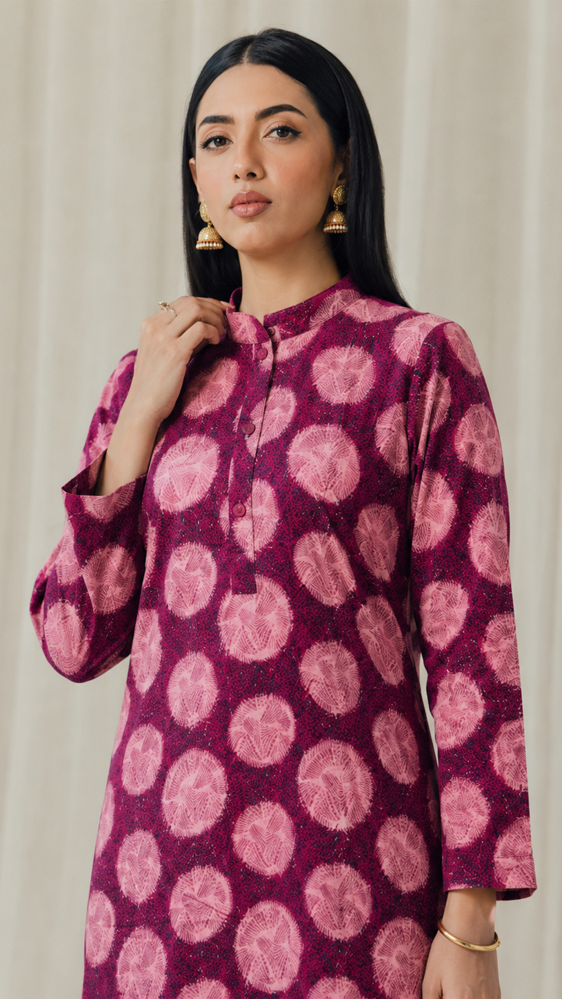 Magenta pink women’s printed kurta dress with circular tie dye pattern, mandarin collar and long sleeves, modest Asian ethnic wear by Diya Online