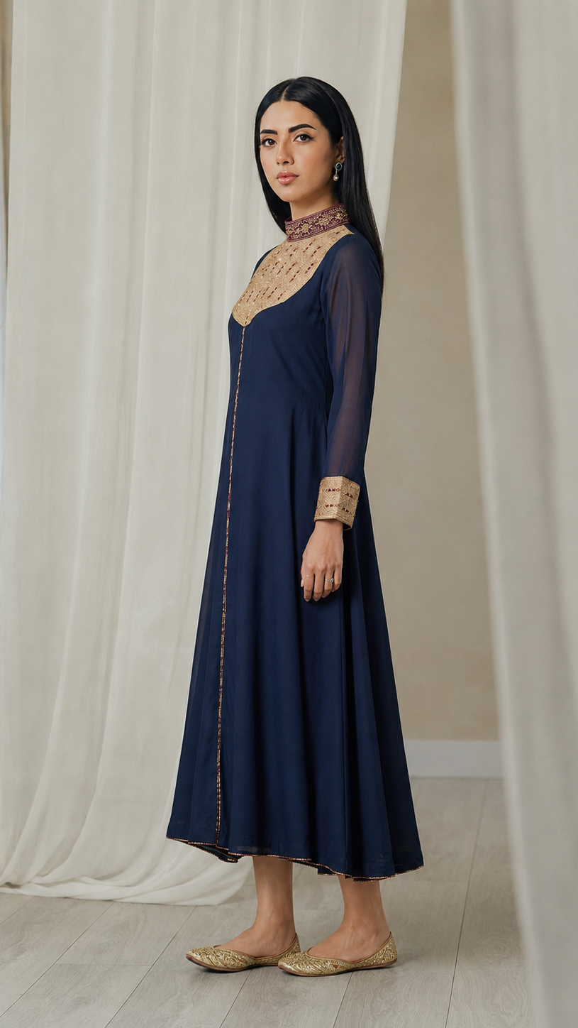 Navy blue women’s embroidered Anarkali kurta dress with sheer sleeves, gold yoke detailing and high neck collar, elegant Asian ethnic wear by Diya Online