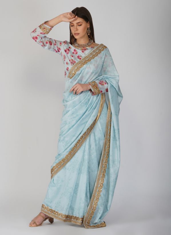 Printed Saree With Gold Zari Embroidery In Blue Colour